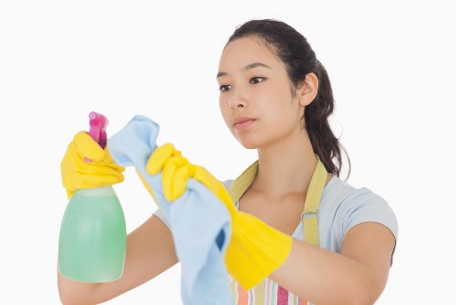 Cleaner maintaining a shared workspace in a Lambeth commercial property