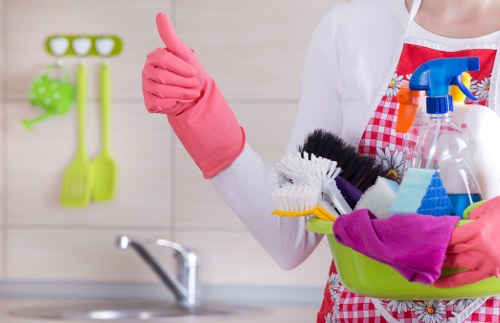 Cleaner working in a Lambeth kitchen during a domestic cleaning visit